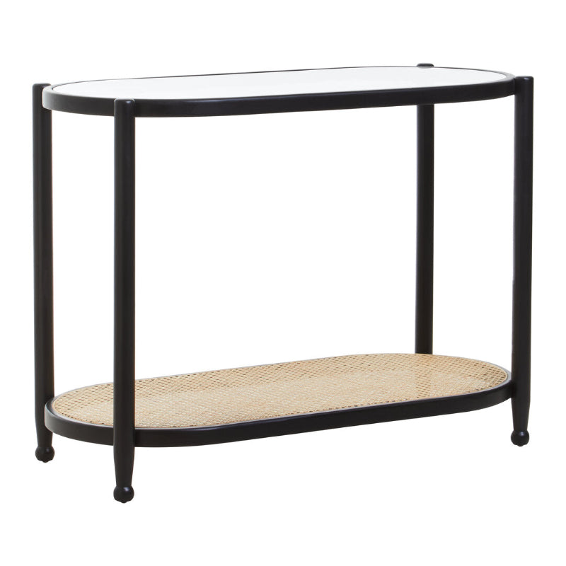 Console table with glass top and wicker shelf on a white background