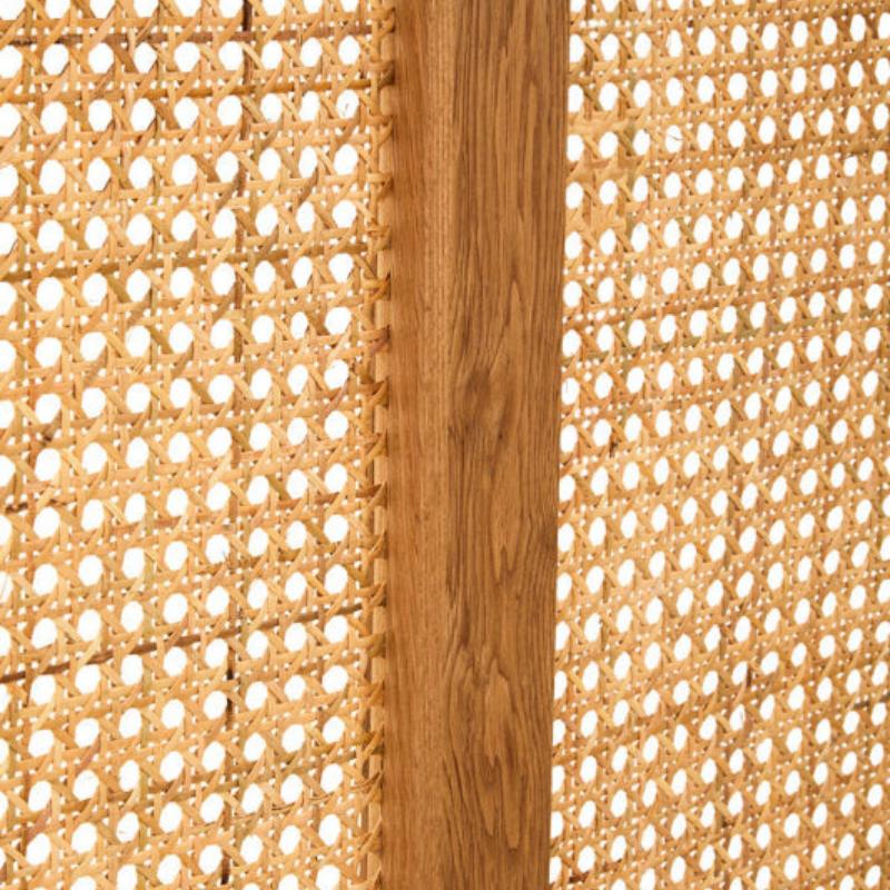 Close-up of woven material with a wooden strip in the center
