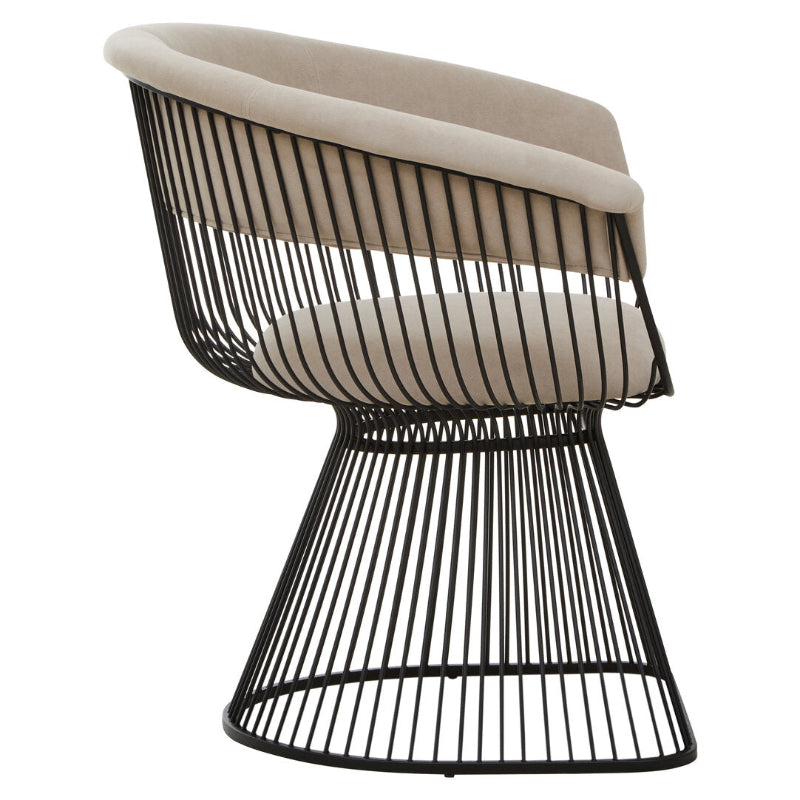 Modern chair with black wire frame and beige cushion on a white background