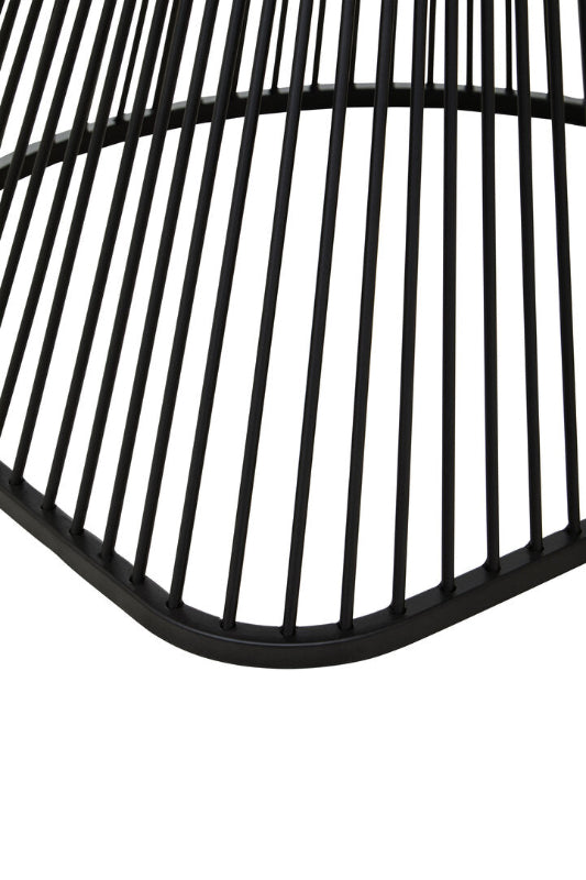 Close-up of a black metal base of chair on a white background