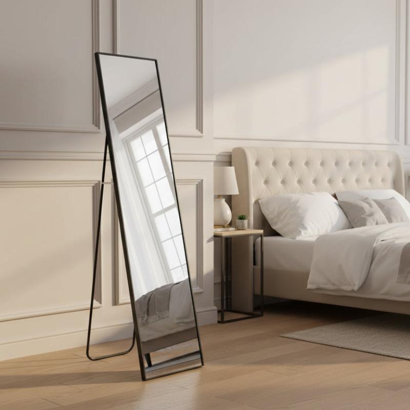 Rectangular mirror with black frame on a white background