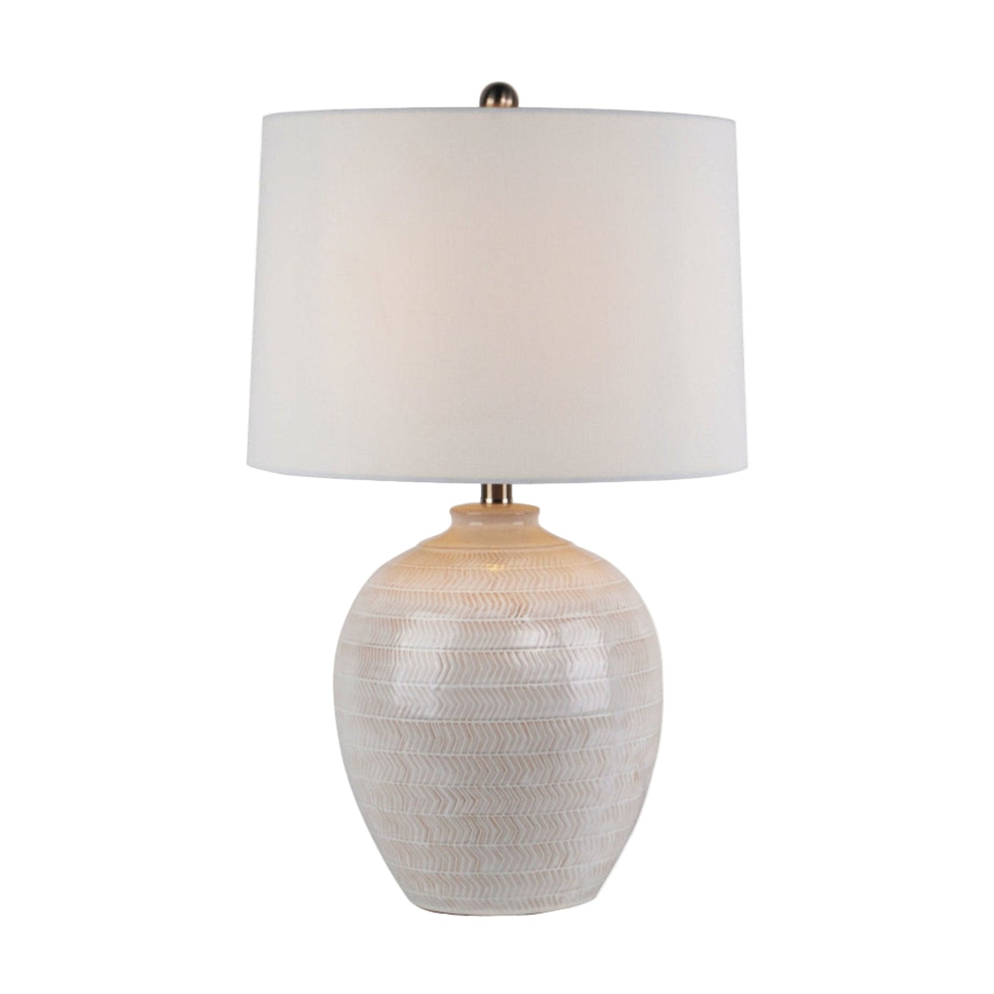 Table lamp with textured white base and white shade on a white background