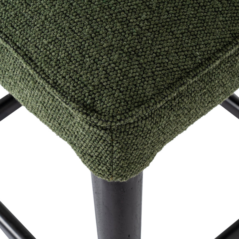 Close-up of a green textured stool with a white background