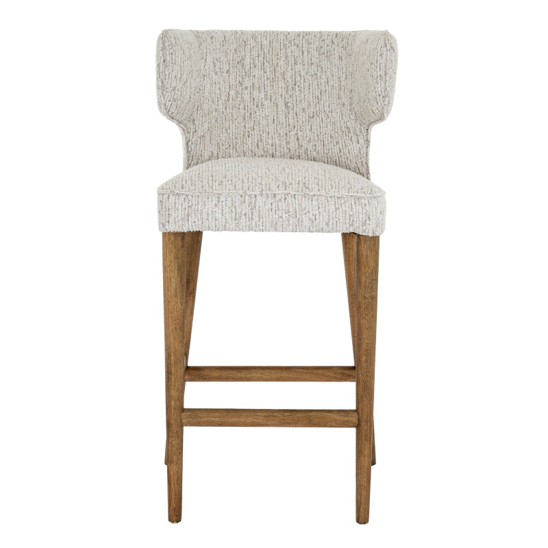 Bar stool with wooden legs and a textured gray cushioned seat on a white background
