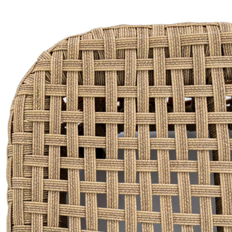 Close-up of a woven chair seat with a geometric pattern on a white background