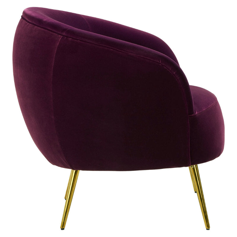 Purple velvet armchair with gold legs on a white background