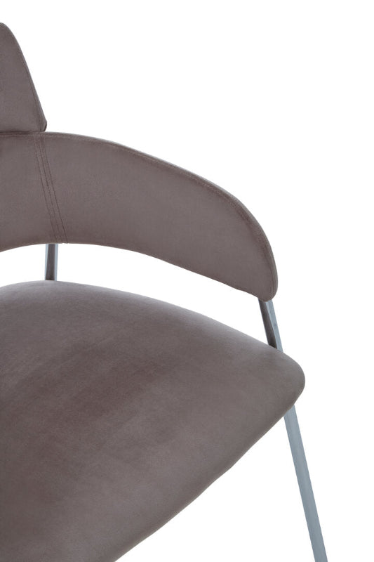 Close-up of a brown chair with a white background