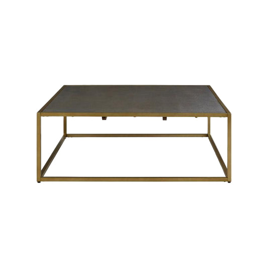 Square coffee table with a dark surface and gold metal frame on a white background