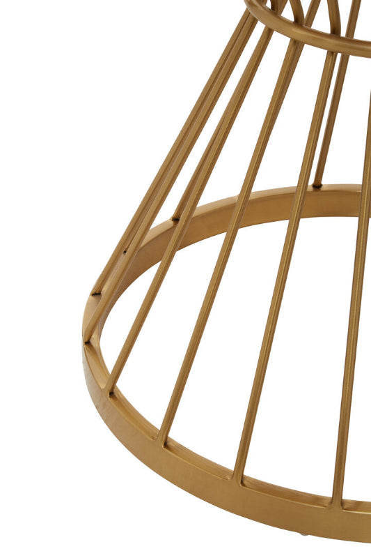 Close-up of a gold metal table frame on a white background