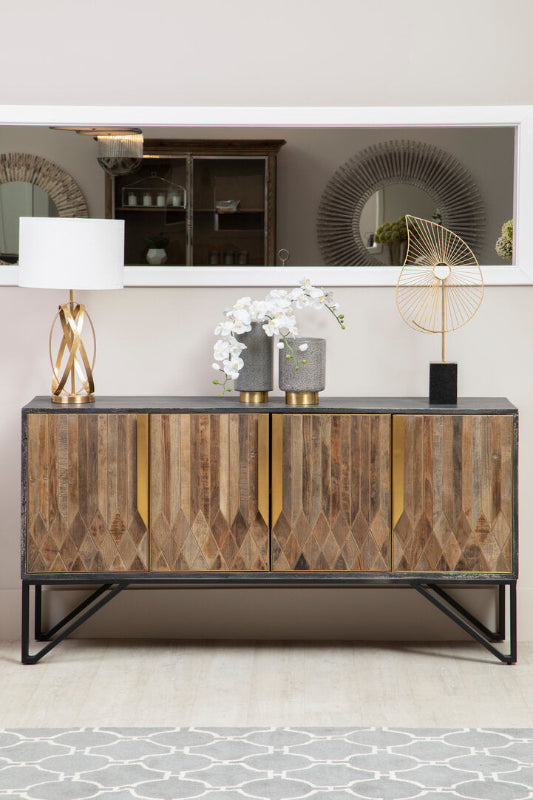 Wooden sideboard with decorative items in a modern interior setting