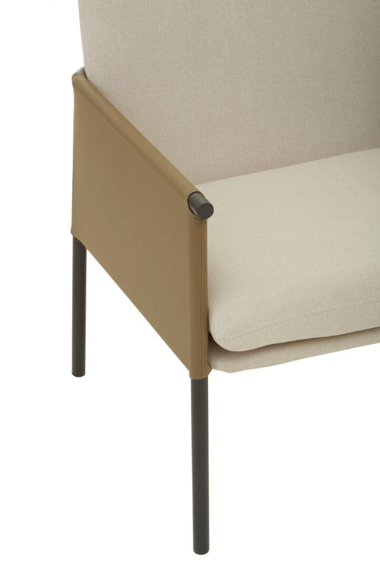 Close-up of a white upholstered chair with metal legs on a white background
