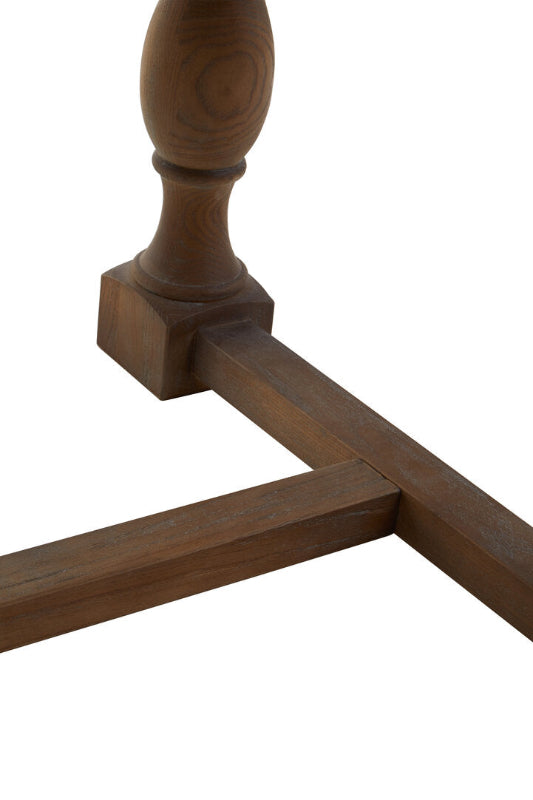 Wooden table leg with a white background