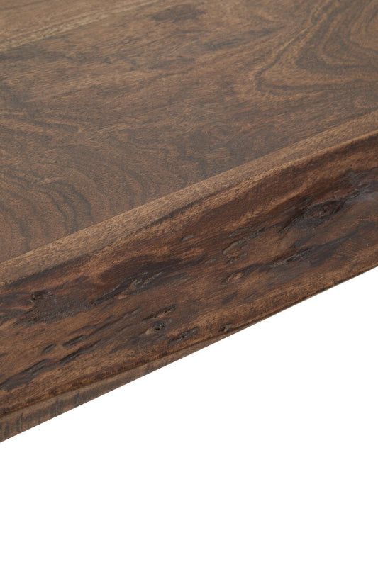 Close-up of a wooden surface with a rich brown color and visible grain pattern.