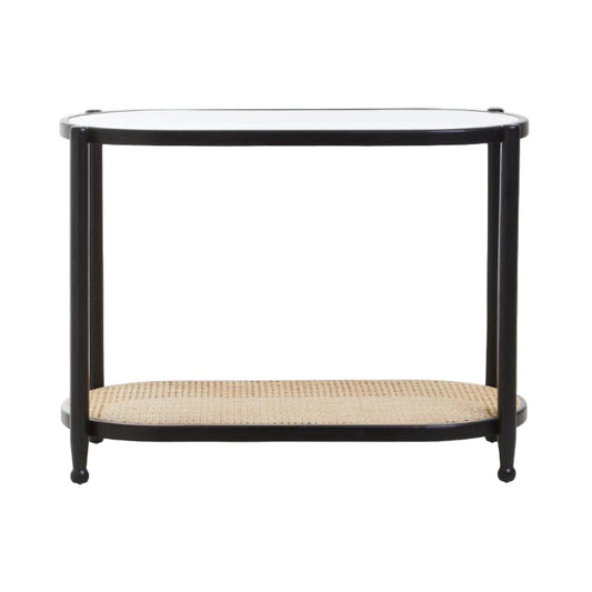 Black metal console table with a glass top and wicker shelf on a white background