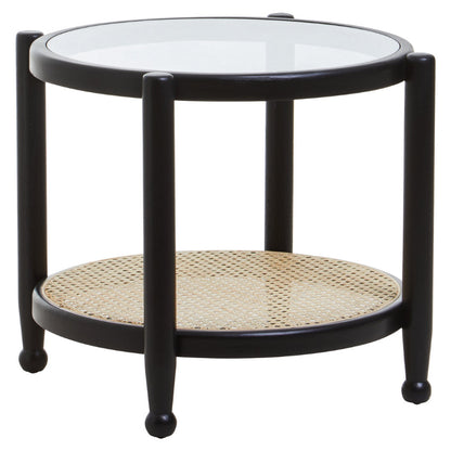 Round side table with glass top and wicker shelf on a white background