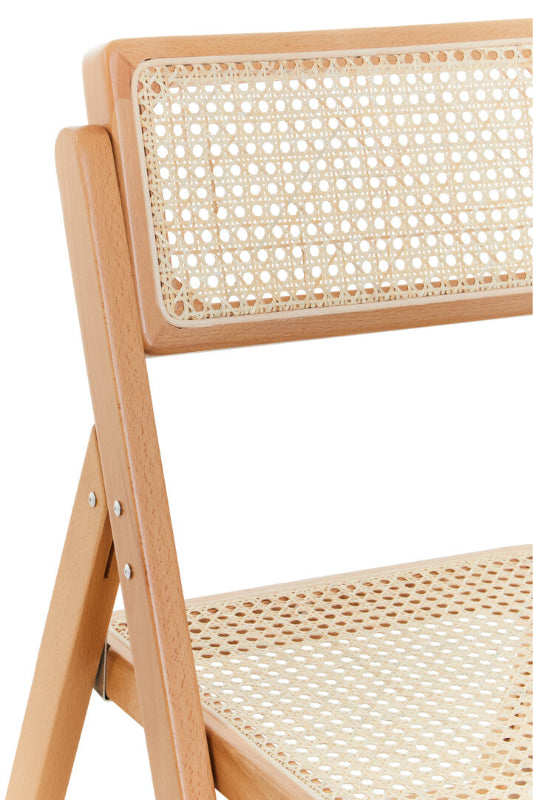 Wooden chair with wicker backrest and seat on a white background