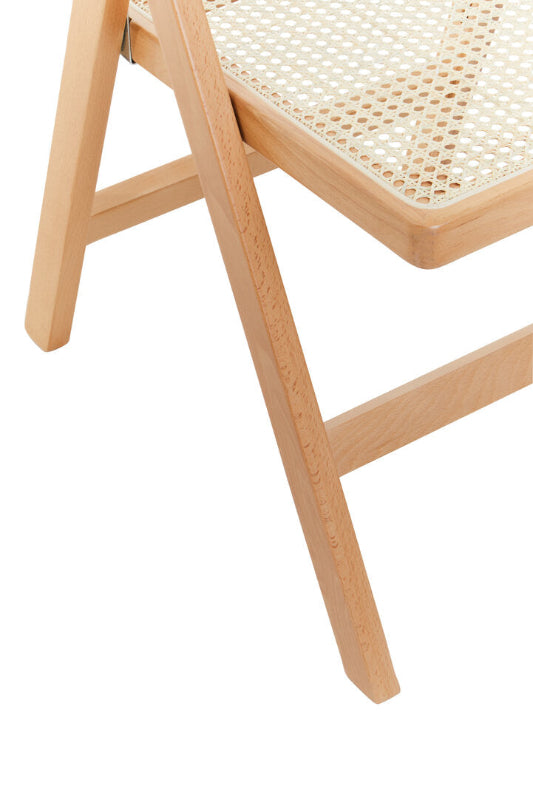Wooden chair with woven seat on a white background