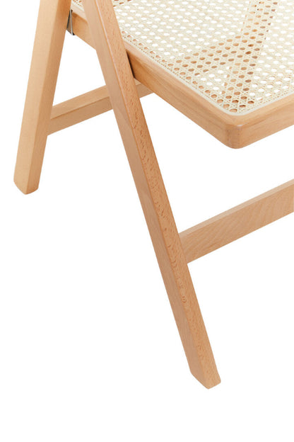 Wooden chair with woven seat on a white background