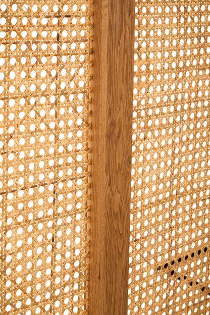 Close-up of woven material with a wooden strip in the center
