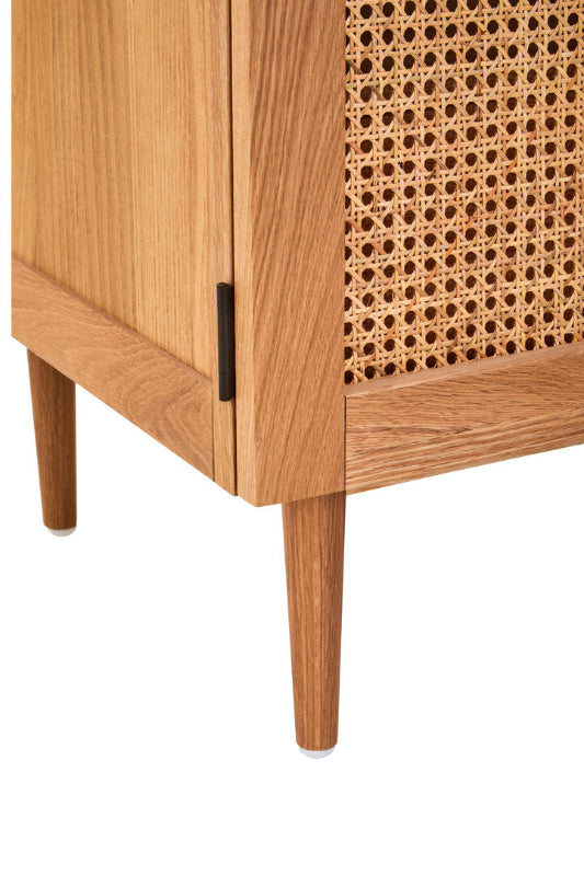 Wooden cabinet with wicker door on a white background