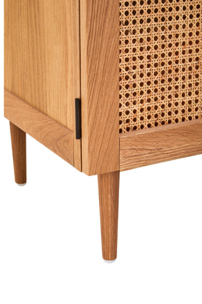 Wooden cabinet with wicker door on a white background