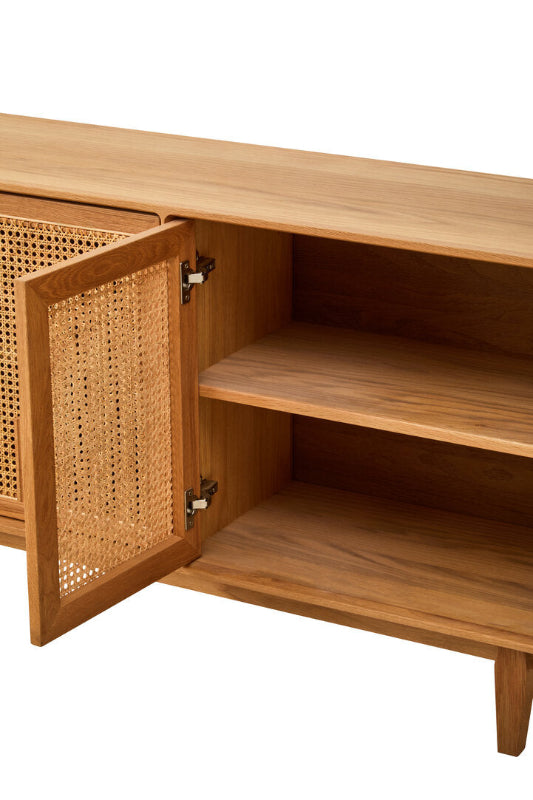 Wooden cabinet with wicker door on a white background