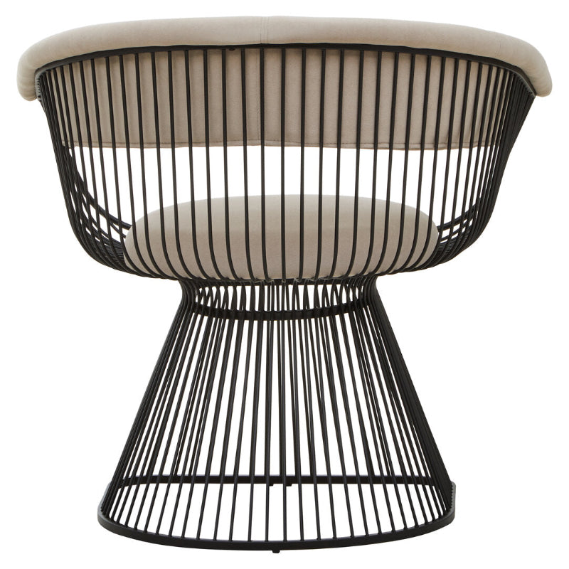 Black wire chair with beige cushion on a white background