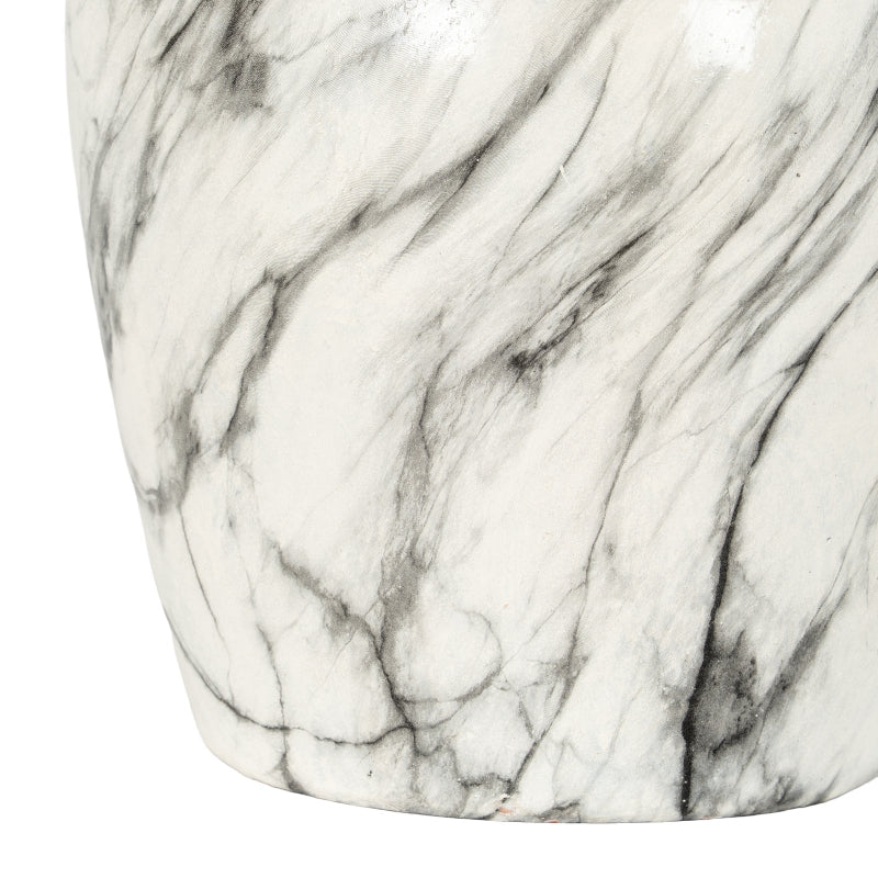 Close-up of a marble-patterned surface with gray and white colors.