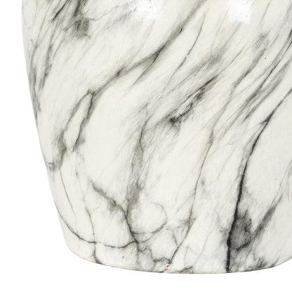 Close-up of a marble-patterned surface with gray and white colors.