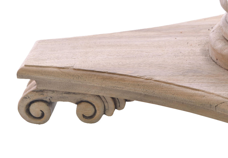 Decorative wooden shelf with classical design on a white background