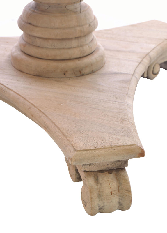 Close-up of a wooden architectural element with intricate carvings on a white background