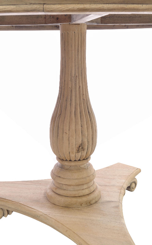 Wooden table leg with decorative design on a white background