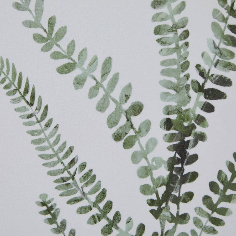 Green leafy pattern on a neutral background