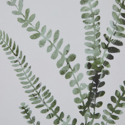 Green leafy pattern on a neutral background