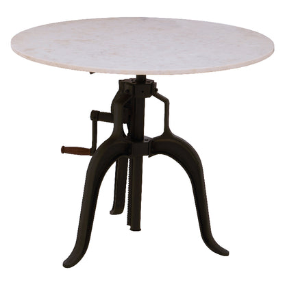 Round marble table with a black metal base on a white background