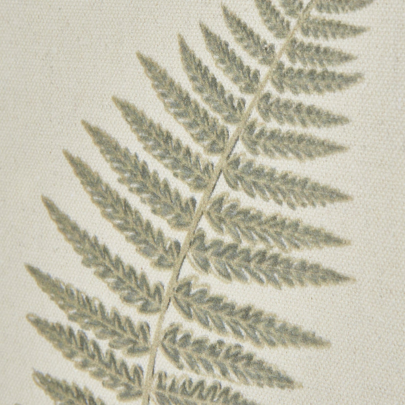Close-up of a fern leaf pattern on a textured surface