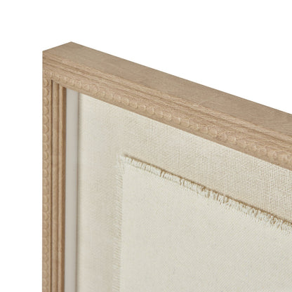 Close-up of a wooden picture frame with beige mat and white background