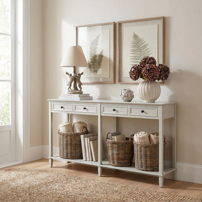 White console table with decorative items in a room with light-colored walls and a rug.