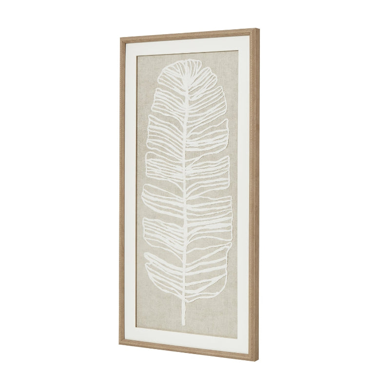 Framed artwork with a white leaf design on a beige background