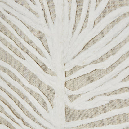 Close-up of white leaf pattern on beige fabric