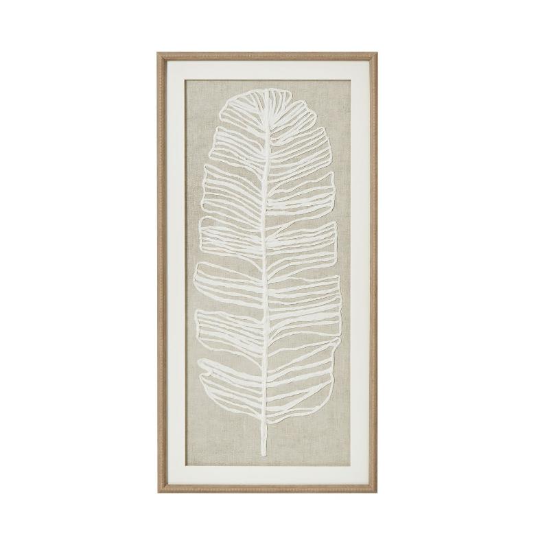 Framed artwork with a white leaf design on a beige background