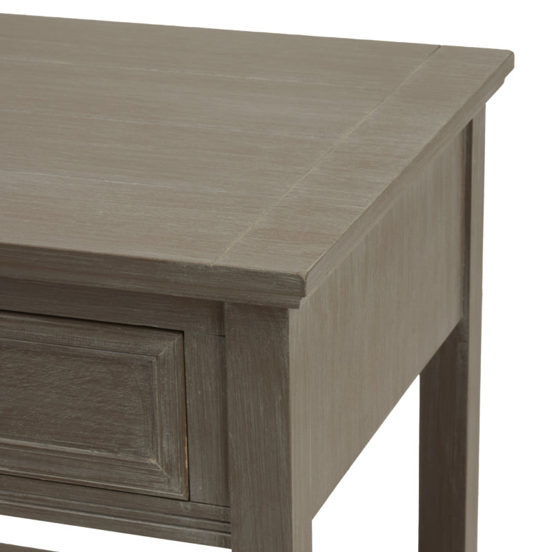 Close-up of a wooden desk with a light grey finish on a white background