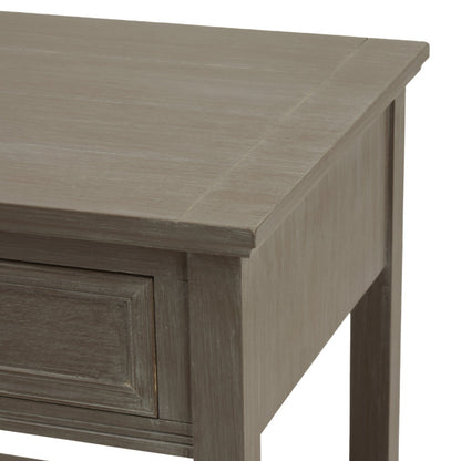 Close-up of a wooden desk with a light grey finish on a white background