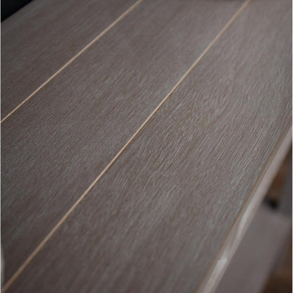 Close-up of a wooden surface with visible grain and texture