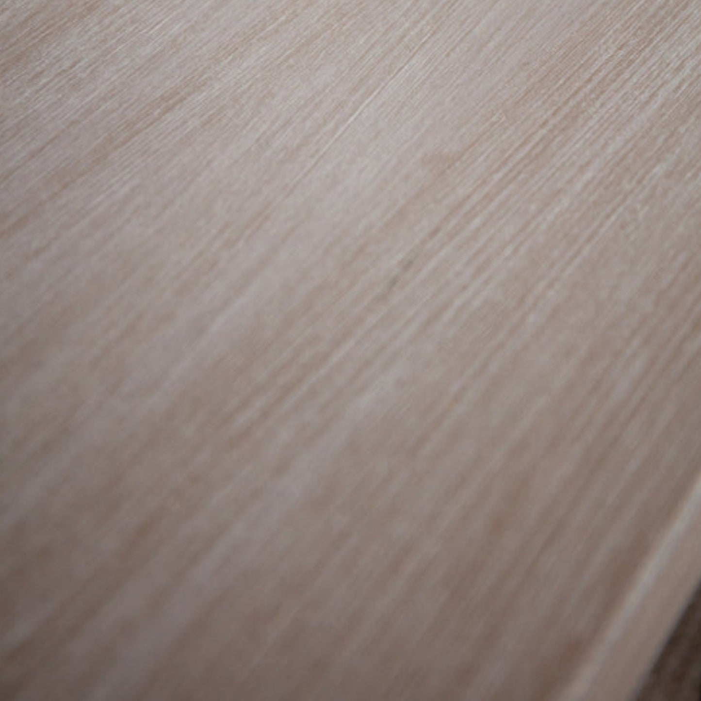 Close-up of a wooden surface with a light brown color.