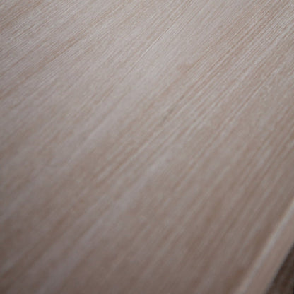 Close-up of a wooden surface with a light brown color.