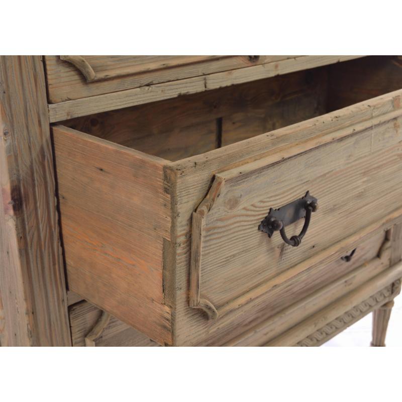Wooden dresser with a drawer open, showing a rustic design.