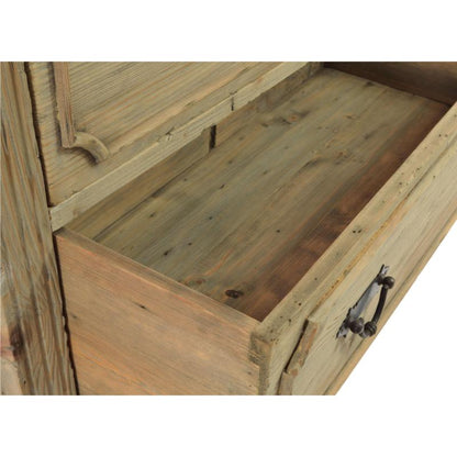Close-up of a rustic wooden chest or cabinet drawer pulled open, showing the wood grain interior and a dark metal pull handle against a white background.