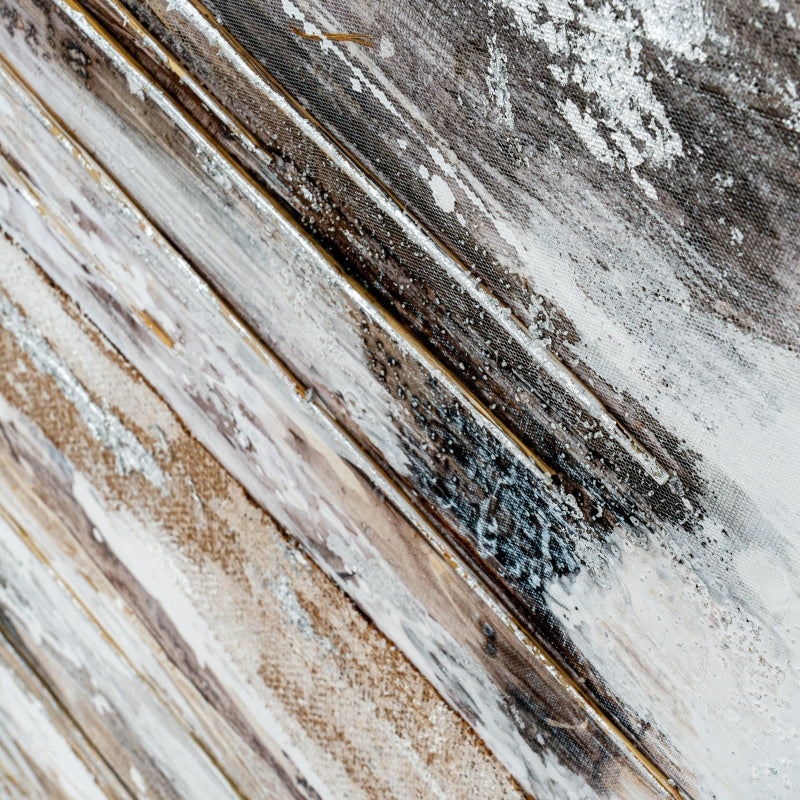 Close-up of a textured surface with brown, beige, and gray colors