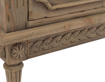 Wooden furniture with intricate carvings on a white background
